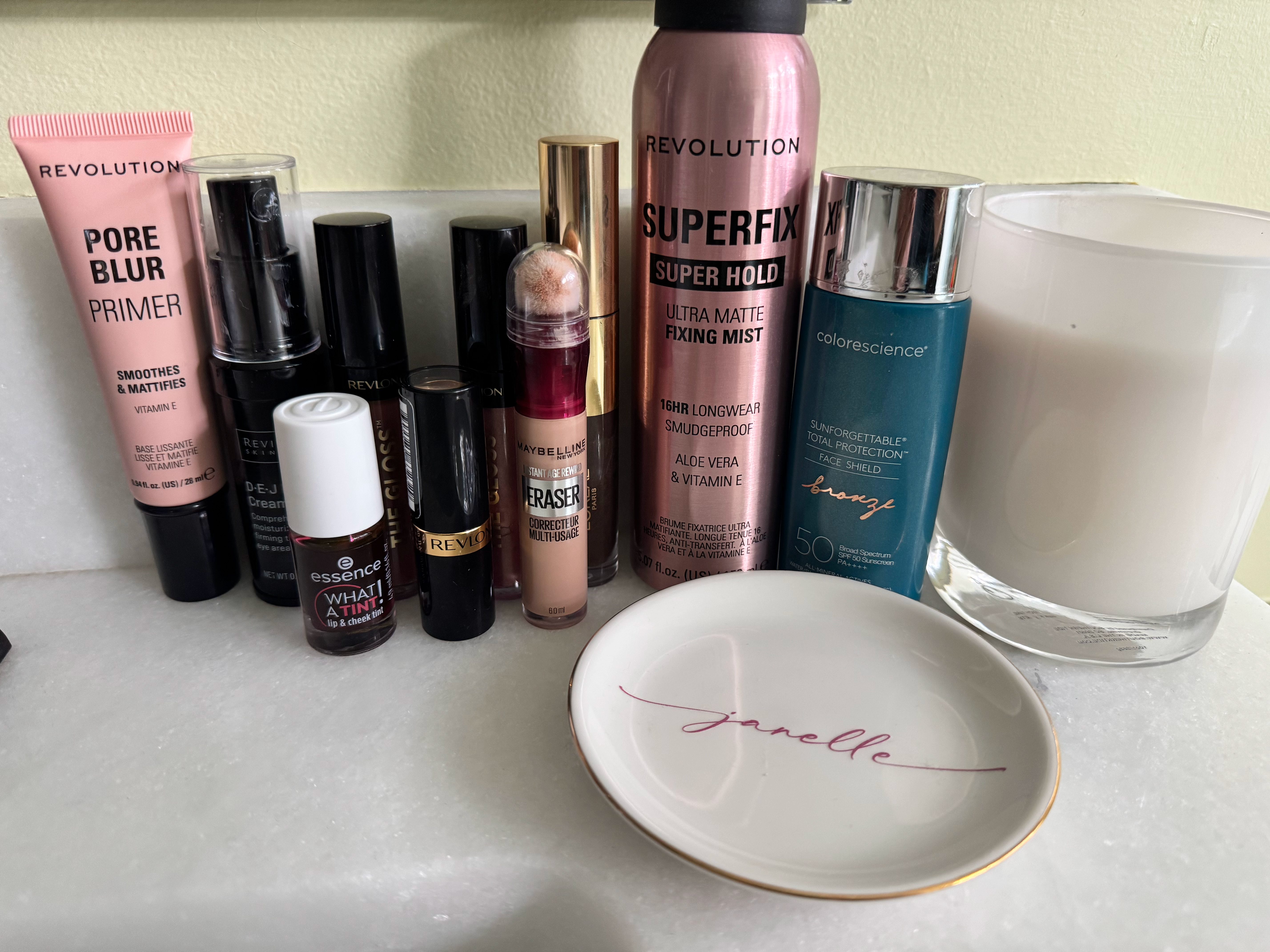 assortment of makeup products